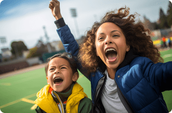 Children reading outdoors in a playground